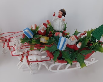 Traineau père Noël et rennes en plastique souple, lot de 2 / kitsch/rare/livraison gratuite/excellent état ++ tarif prépayé