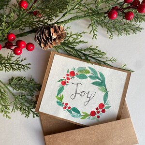Carte de Noël, couronne de joie des fêtes, aquarelle