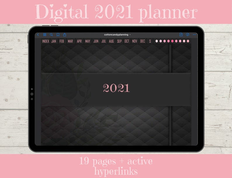 May include: A digital planner for the year 2021, displayed on a laptop screen. The planner has a black and white checkered pattern and the text "2021" in white. The planner has 19 pages and includes active hyperlinks.