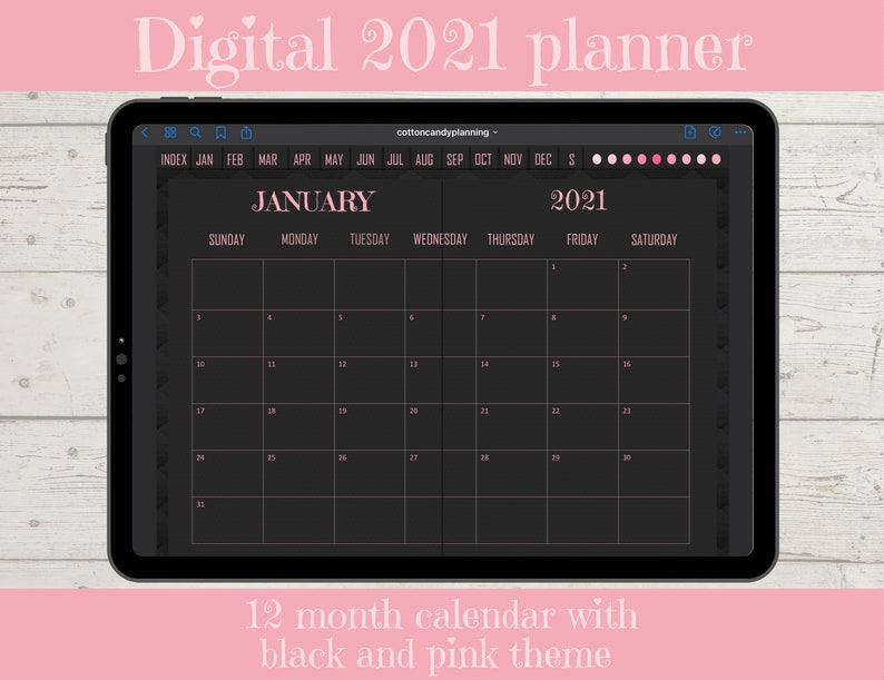 May include: A digital planner for the year 2021 with a black and pink theme. The planner is displayed on a tablet screen and shows the month of January with the days of the week labeled. The planner includes an index for each month of the year.