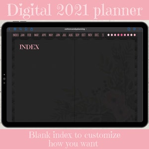 May include: A digital planner for the year 2021 with a blank index page. The planner has a black background with a floral design on the right side. The top of the planner shows the months of the year, from January to December.