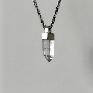 Clear quartz crystal pendant