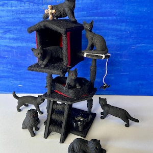 Miniature Black Cats