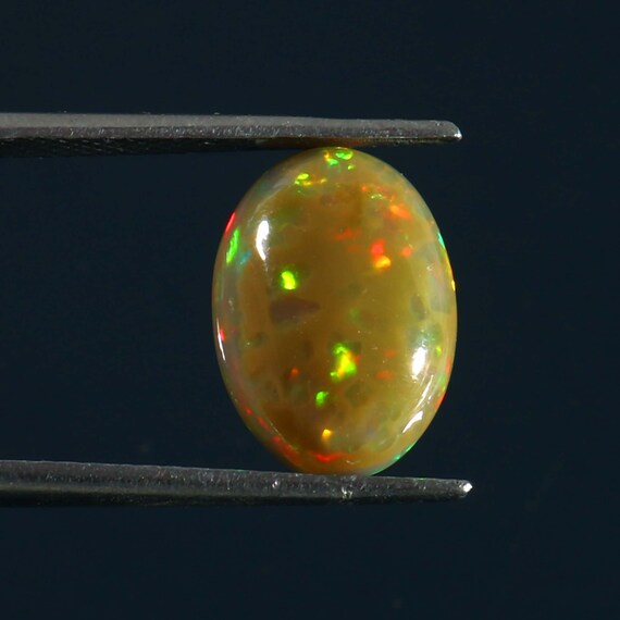 Cabochon Ovale En Opale Noire éthiopienne Naturelle - Taille 13x9x5 Mm - Effet Feu Rouge - 2.30 Carats