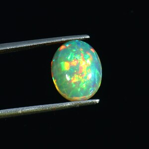 Wonderful Top Grade Quality 100% Natural Flashy Fire Ethiopian Opal Oval Shape Cabochon Loose Gemstone For Making Jewelry 2.6 Ct. 11X9X6 mm