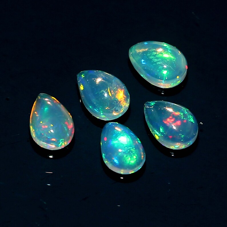 23.7X16.6X8.3 MM Black Ethiopian Pear Shape Opal Welo Fire Opal Gemstone 14 Carat Smooth Opal Gemstone.