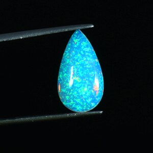 Natural Ethiopian Fire Opal Pear Shape Cabochon Celebrated Size 9.4x17mm Blue Dot Pin Fire Opal Loose Gemstone For Making Jewelry 2.90 Cts