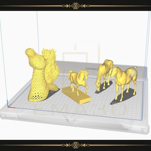 May include: A 3D printed model of a golden fish with a long flowing tail, a horse with a raised head, and two horses standing side by side. The models are on a white platform with a grid pattern.