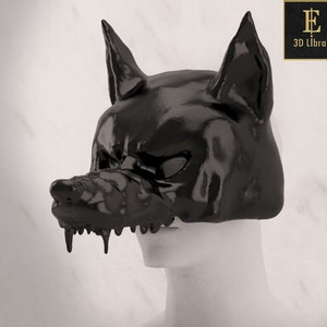 Könnte beinhalten: Eine schwarze Wolfsmask mit tropfenden Kanten. Die Maske besteht aus einem glatten, glänzenden Material und hat ein realistisches Wolfsgesicht.