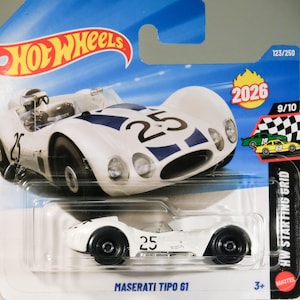 May include: A white Maserati Tipo 61 die-cast model car with black wheels and the number 25. The car has blue stripes and is part of the Hot Wheels HW Starting Grid series. The packaging includes the Hot Wheels logo and the number 123/250.