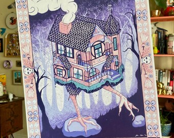May include: A whimsical illustration of a purple and pink house with a chimney and smoke, perched on spindly legs in a dark forest. The house has a detailed facade with windows and a porch. The background is a dark purple with a border of pink and white floral patterns.
