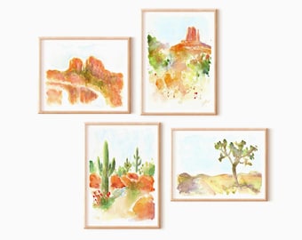 Peut inclure: Quatre aquarelles de paysages désertiques. La peinture en haut à gauche montre une formation rocheuse rouge avec de la végétation verte. La peinture en haut à droite montre une formation rocheuse rouge avec de la végétation verte et un ciel bleu. La peinture en bas à gauche montre un cactus haut avec de la végétation verte et un ciel bleu. La peinture en bas à droite montre un Joshua tree avec un ciel bleu.