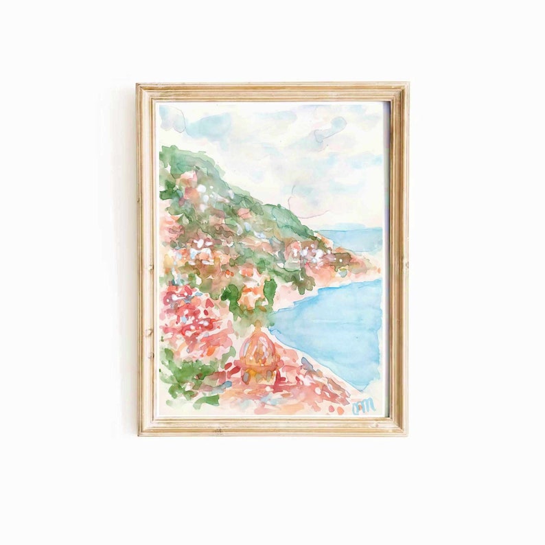 May include: A watercolor painting of a coastal landscape with a hillside covered in green trees and pink and orange flowers. The hillside slopes down to a blue bay with a white sandy beach.