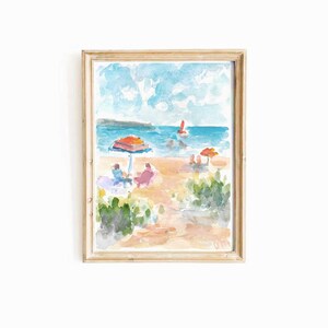 May include: A watercolor painting of a beach scene with people relaxing under umbrellas. The painting features a blue sky with white clouds, a blue ocean, a sandy beach, and green bushes.