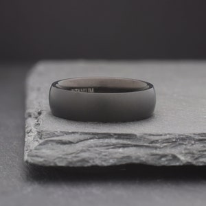 simple black domed titanium wedding ring