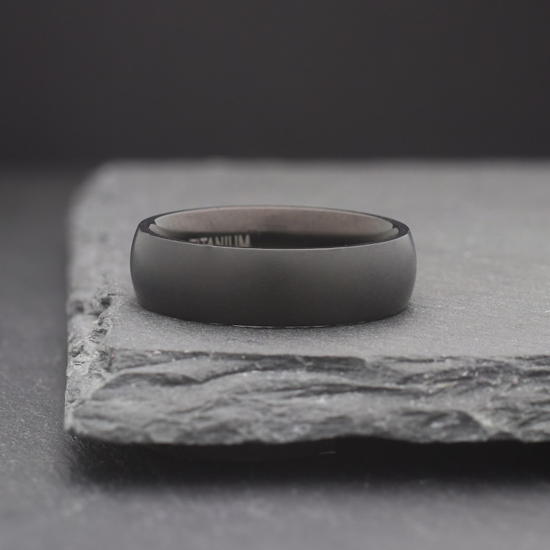 simple black domed titanium wedding ring
