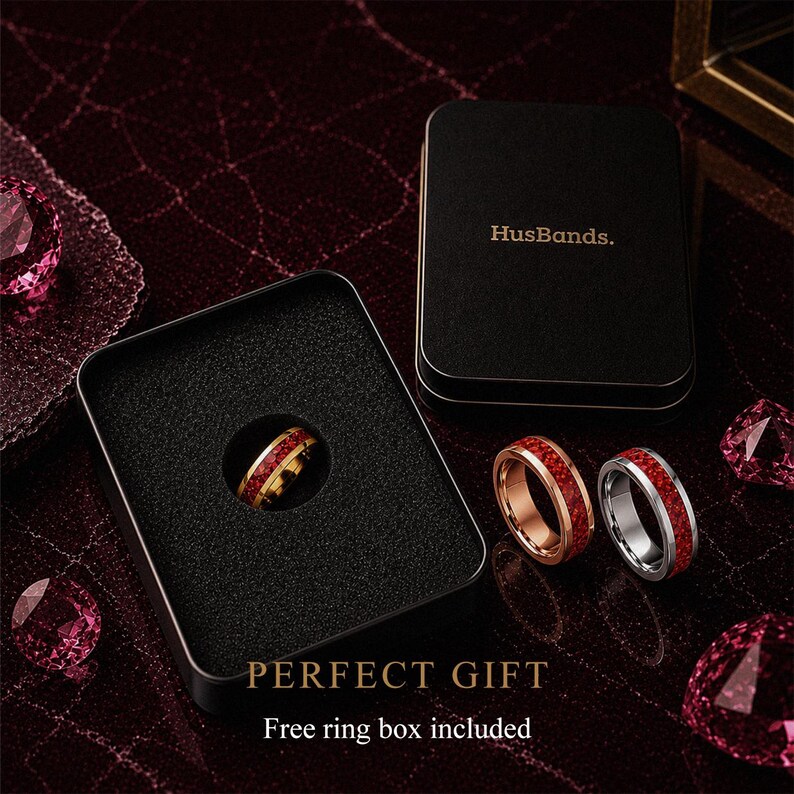 Ruby tungsten wedding ring presented in a HusBands premium gift box.