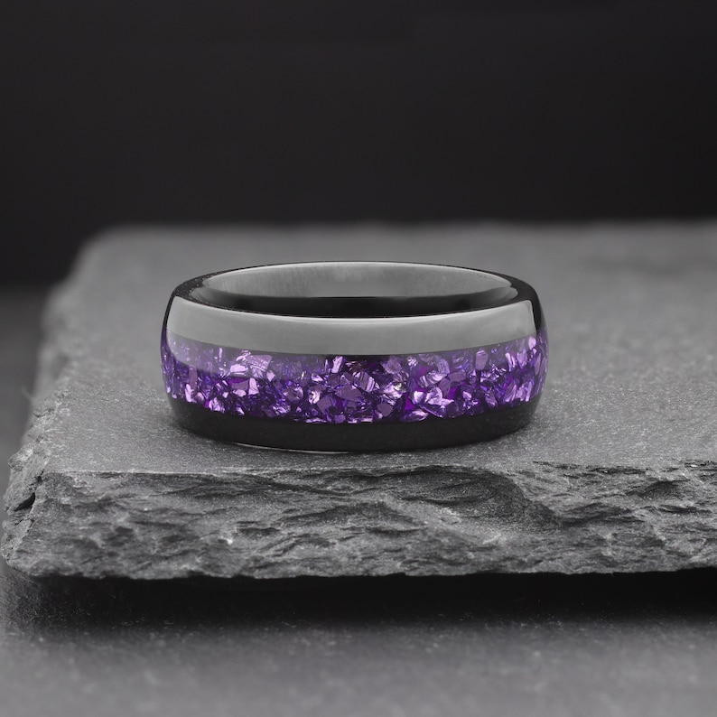 black tungsten ring with purple amethyst inlay
