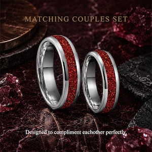 Matching men's and women's ruby tungsten wedding ring set with red gemstone inlays.
