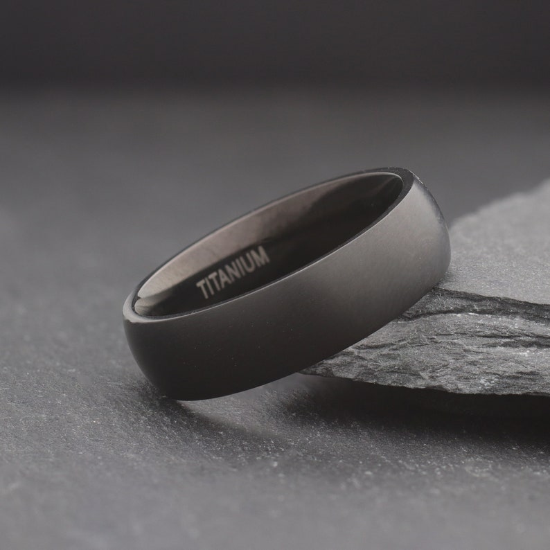 simple black domed titanium wedding ring