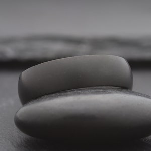 simple black domed titanium wedding ring