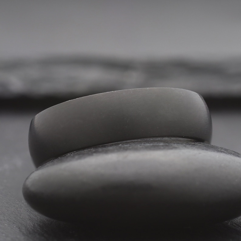 simple black domed titanium wedding ring