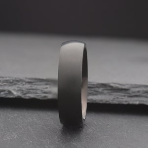 simple black domed titanium wedding ring