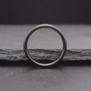 simple black domed titanium wedding ring