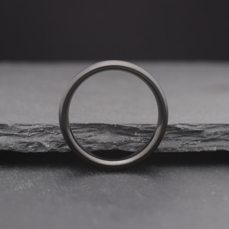 simple black domed titanium wedding ring