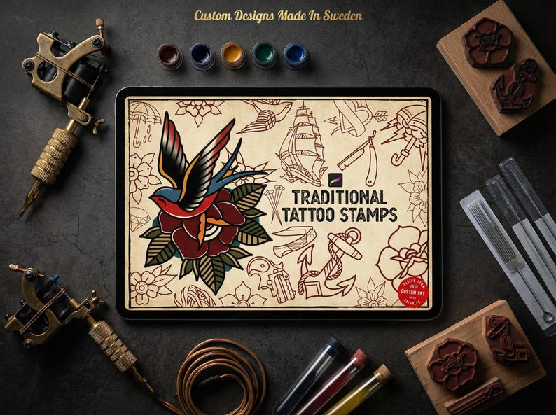 May include: An overhead shot features tattoo art supplies. A tablet displays traditional tattoo stamp designs, including a swallow and rose. Tattoo machines, ink, and stamps are arranged on a dark surface. Text reads "Custom Designs Made in Sweden."
