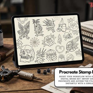 May include: A digital tablet displays various tattoo-style illustrations, including eagles, roses, skulls, and swallows. Tattoo ink bottles, a tattoo machine, and a stack of notebooks are on a wooden surface. The text "InkBundles" is visible.
