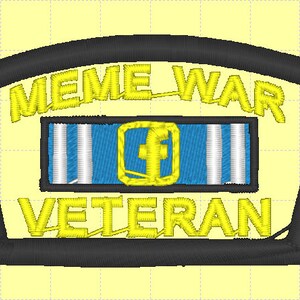 May include: A black and yellow embroidered patch with the text "MEME WAR VETERAN" and a blue and white ribbon with a yellow symbol in the centre.