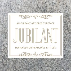 May include: A rectangular card with a cream background and a gold border. The card features the word "JUBILANT" in a bold, Art Deco font. The text "AN ELEGANT ART DECO TYPEFACE" and "DESIGNED FOR HEADLINES & TITLES" are also displayed.