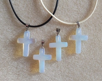An Opalite Cross pendant (with 18" Black Cord chain with 2" extension) - Cross is 20mm x 30mm.