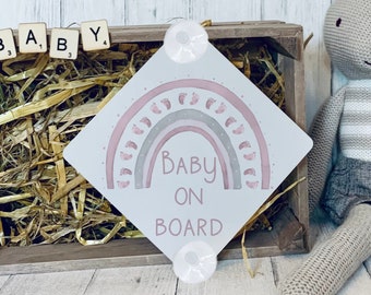 Baby on board sign. Pink baby footprint rainbow. Aluminium window sign with suction cups to adhere to the window.