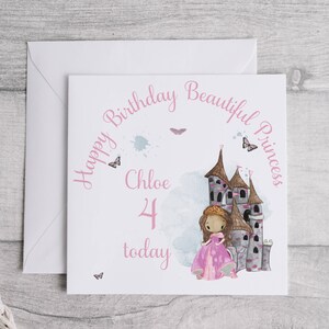 May include: A pink birthday card with a princess and a castle illustration. The card says "Happy Birthday Beautiful Princess Chloe 4 today".