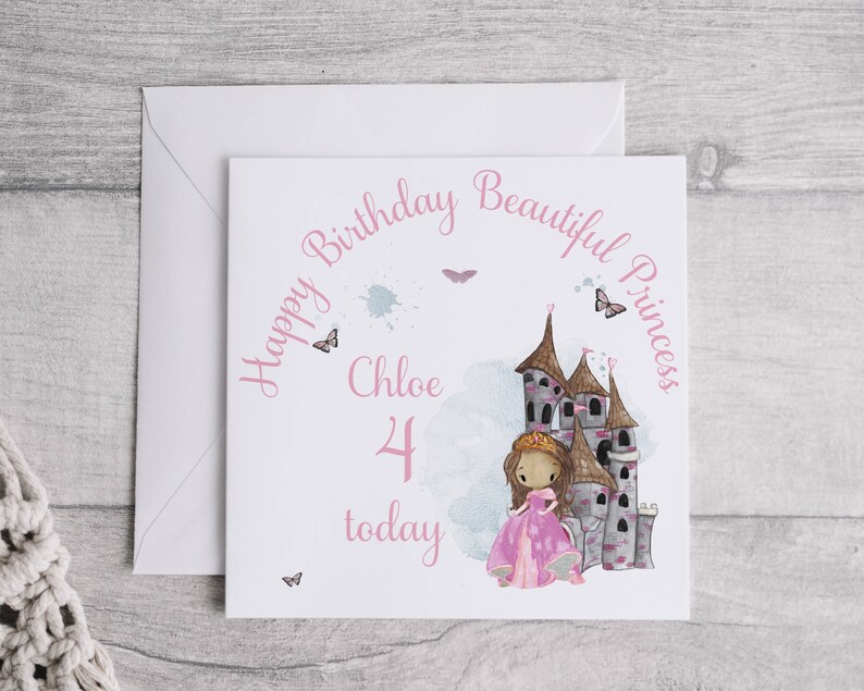 May include: A pink birthday card with a princess and a castle illustration. The card says "Happy Birthday Beautiful Princess Chloe 4 today".