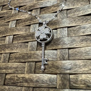 Silver Spinning Key-Shape (Type #2) Necklace with Cubic Zirconia – Anxiety Relief Jewelry