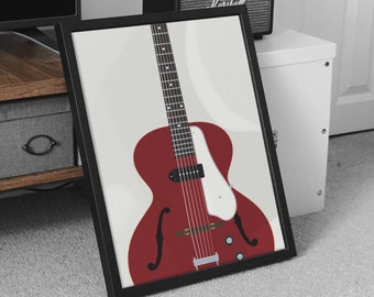 May include: A red electric guitar with a white pickguard and chrome hardware. The guitar has a hollow body and a single cutaway. The guitar is framed in a black frame.