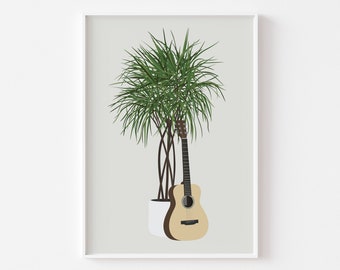May include: A framed art print featuring a green houseplant in a white pot, with a brown acoustic guitar leaning against it. The background is a light gray color, and the print is in a white frame.