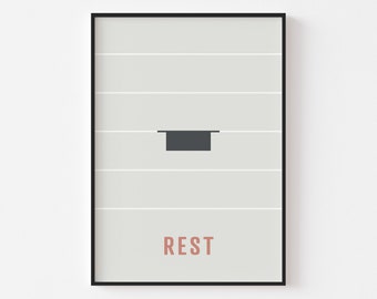 May include: Framed art print with a minimalist design. The artwork features a gray background with horizontal white lines and a dark gray rectangular shape. The word "REST" is printed in a muted red color at the bottom.