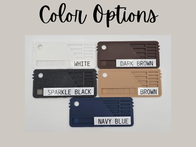 Puede incluir: Imagen que muestra opciones de color para un producto. Los colores son blanco, marr&oacute;n oscuro, negro brillante, marr&oacute;n y azul marino. Cada color se muestra en una muestra rectangular con el nombre del color en texto blanco.