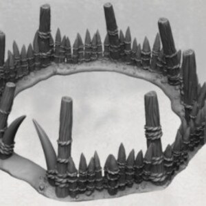 May include: A circular wooden fence with pointed stakes and rope accents. The fence is made of rough-hewn logs and has a rustic appearance.