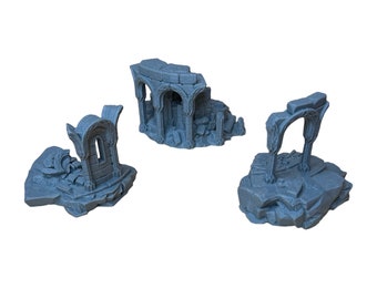 May include: Three gray 3D printed miniature ruined stone archways, each with a different design. The archways are on a white background.