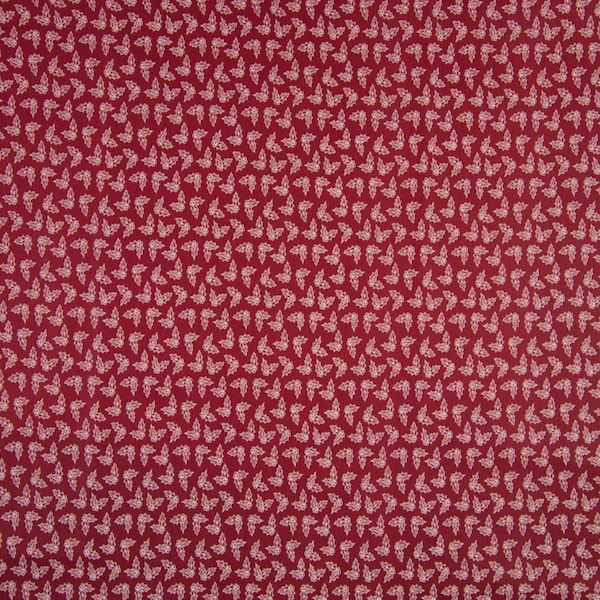 Tissu 100% Coton de Noël Feuilles de Houx sur fond rouge