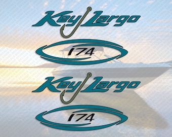 May include: Two teal blue and black Key Largo boat decals with a fishing hook graphic and the number 174.