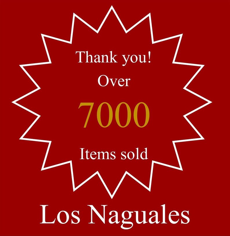 May include: A red starburst with white outline, with the text "Thank you! Over 7000 Items sold Los Naguales" in white and gold lettering.