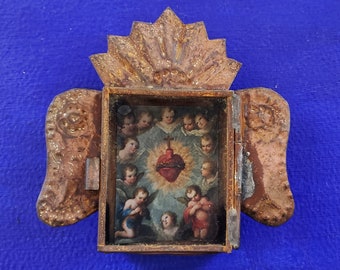 Rustic Mexican Flaming Sacred Heart Jesus Christ with Angels Cherubs tin wall hanging nicho folk art rusty Catholic church player baroque