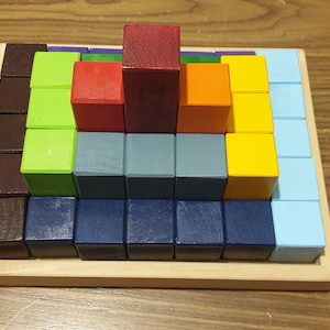 Stacking wooden blocks Montessori toy building pyramid with wooden blocks