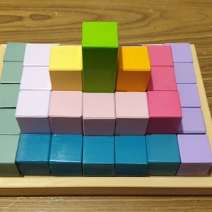 Stacking wooden blocks Montessori toy building pyramid with wooden blocks
